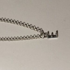 Silver letter E charm necklace